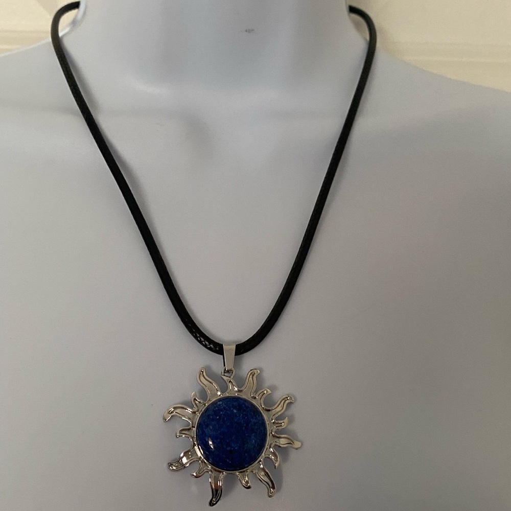 Luminous Silver Sunburst Necklace with Blue Center